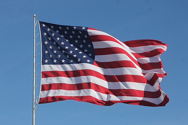 American flag waving on a flag pole